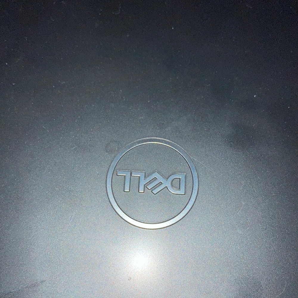 Dell laptop with mouse included.